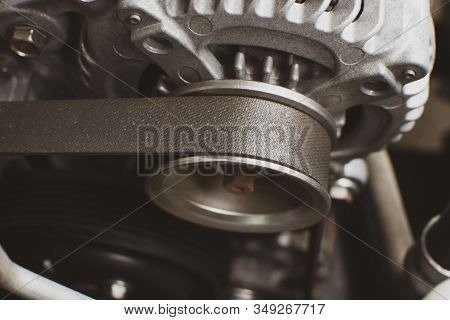 Timing Belt Of Old Alternator In Engine System Of Car, Automotive Part Concept.