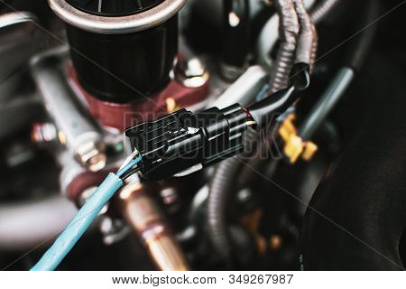 Electric Socket Wire Connector To Car O2 Oxygen Sensor Of Engine System, Automotive Part Concept.