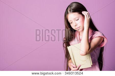Home Education. Happy Childhood. Small Girl Read Interesting Story. Fiction Book. Keep Her Secrets I
