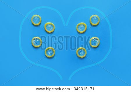 Condoms Inside The Heart. Concept - Safe Love Relationships