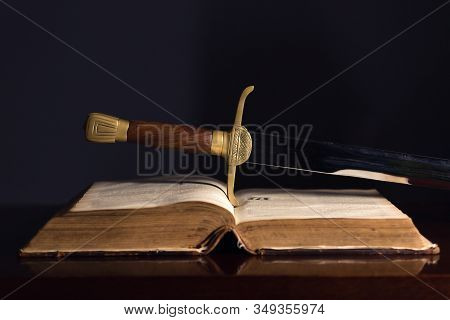 One Hundred Fifty Year Old Bible With Sword