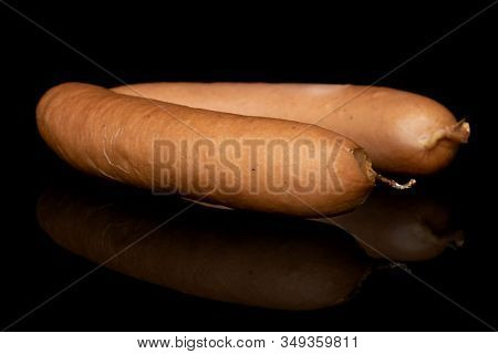 Group Of Two Whole Pork Frankfurt Sausage Isolated On Black Glass