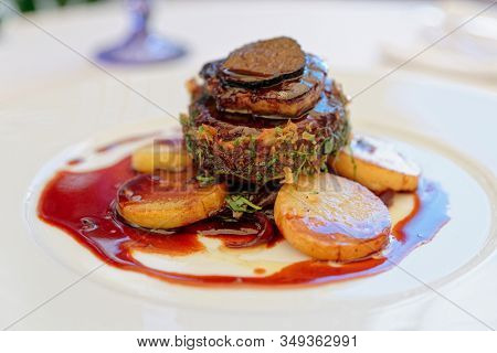 Chateaubriand steak with foie gras and truffle, French dish