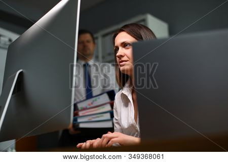 Competent And Experienced Woman Works On Computer. Office Has Created Ideal Conditions For Self-orga