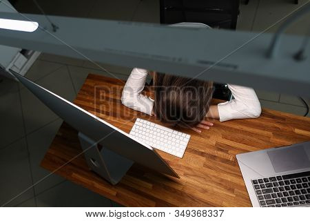 Girl Leaned Over Table Office, Sleeps With Fatigue. Constant Monitoring Causes Certain Tension Emplo