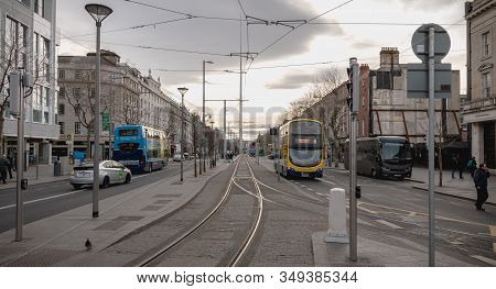 Dublin, Ireland - February 12, 2019: Typical Irish Double Decker Bus Running With Its Passengers In 