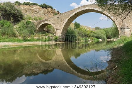 Photographs Of The Arched Historic Bridge Made Of Stone