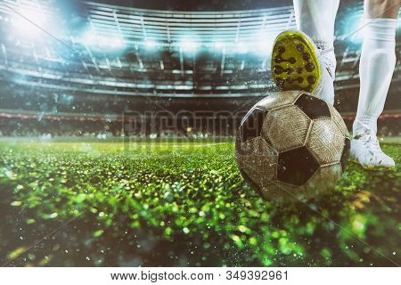 Close Up Of A Soccer Striker Ready To Kicks The Ball At The Stadium