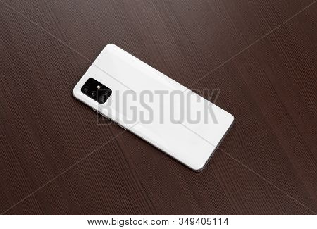 Rostov-on-don, Russia - January 2020. Samsung Galaxy A51 On A Wooden Background. Smartphone On Woode