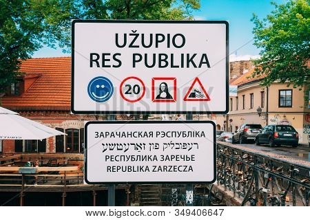Vilnius, Lithuania - July 5, 2016: Road Sign At Border Of Uzupis Located In Old Town Of Vilnius. Dis