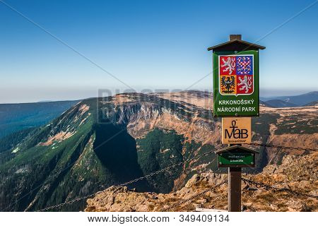 Krkonose, Czech Republic, October, 2018: Wooden Sign Krkonose National Park. On A Background Are Cze
