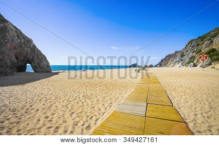 Adraga Beach Landscape And Rock Arch, Atlantic Ocean. Almocageme, Sintra, Portugal