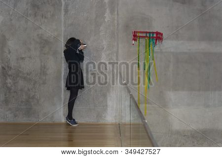 Capital Federal, Buenos Aires / Argentina; Oct 30, 2016: Young Girl Photographing A Work Of Art At T