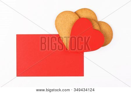 Red Mockup Greenting Card With Heart Shape Cookies On A White Backround. Simbol Of Cozy Love And Val
