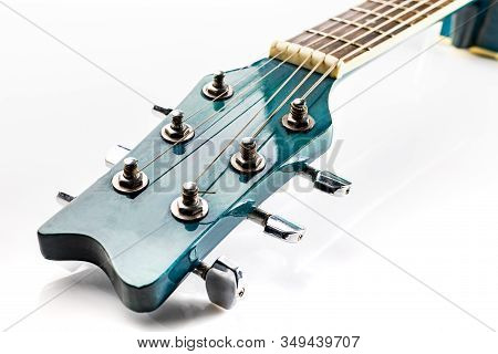 Headstock Of Classic Acoustic Guitar With Tuning Keys, On A White Background.