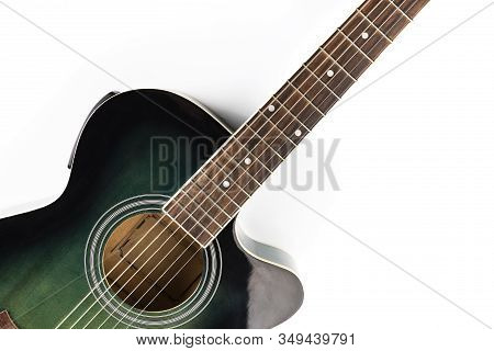 Classic Acoustic Guitar On A White Background, Close-up.