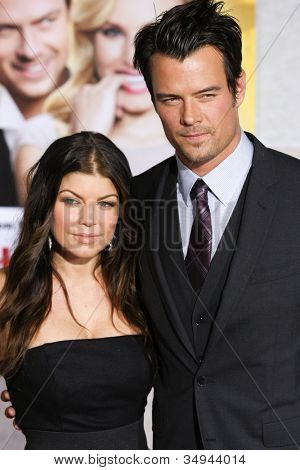 HOLLYWOOD, CA - JAN 27: Josh Duhamel & Fergie z Black Eyed Peas uczestniczyć idealna When In Rome