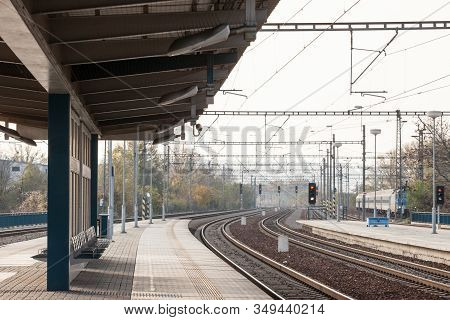 Recently Reconstructed Tracks On The Modernized Platforms Of A Suburban Train Station In A Capital C