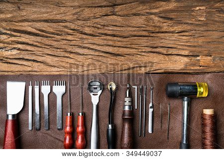 Leather Craft Tools On Desk In Tailoring Workshop