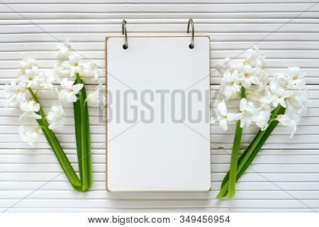 Spring Flat Lay.spring To-do List.white Blank Notebook, Cup Of Tea And Spring Flowers White Hyacinth