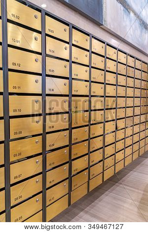 Metallic Letter Mailbox Rows In Postal Room Facilities Of Condominium
