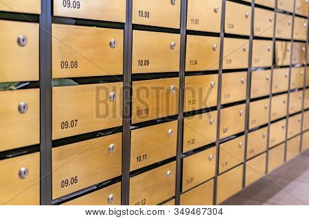 Metallic Mailbox Array At Postal Room Inside Modern Apartment Building