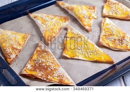 Samsa With Pumpkin On A Baking Tray.