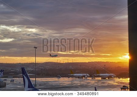 Istanbul Sabiha Gokcen Airport - January 2020. Aircraft Is Landing Opposite Rising Sun