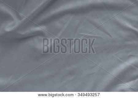 White Linen Bed Sheet Texture In Hotel Bedroom. Closeup Detail Of Messy White Bed Sheet. Comfortable