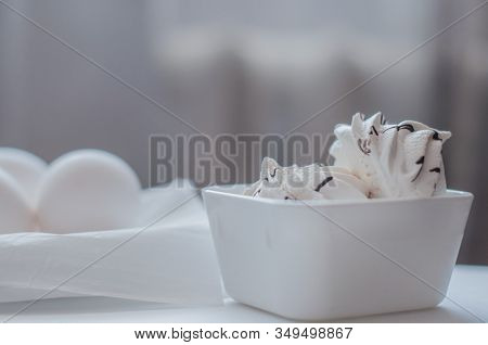 Protein Breakfast, Eggs And Merinques On White Kitchen Table