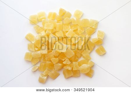 Dried Pineapple Cubes On A White Background. Candied Pineapple Top View. Sweet Dried Pineapples In S