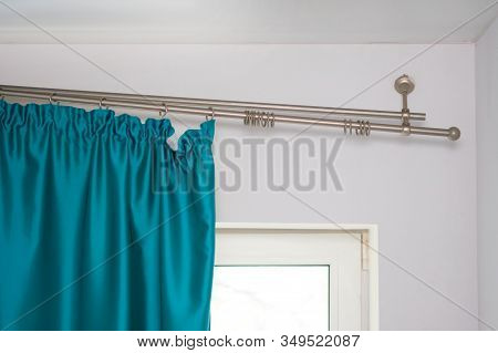 The Cornice Attached To The Wall Squinted Down. The Wall Mount On Which The Curtains Are Hanging Fal