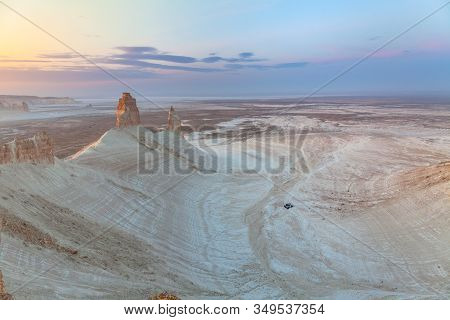The Ustyurt Plateau. A Group Of Tourists In Cars Stopped For The Night. District Of Boszhir. The Bot