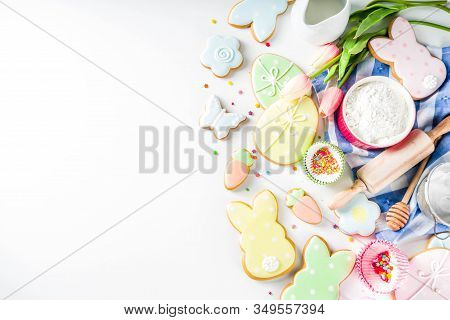 Sweet Easter Baking Cooking Background With Traditional Easter Bunny And Egg Cookies, Sugar Sprinkle