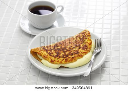 cachapa, venezuelan corn pancake with handmade cheese