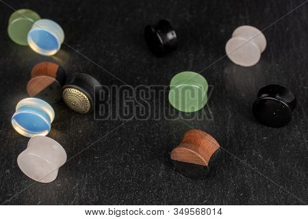 Lot Of Whole Plug On Grey Stone