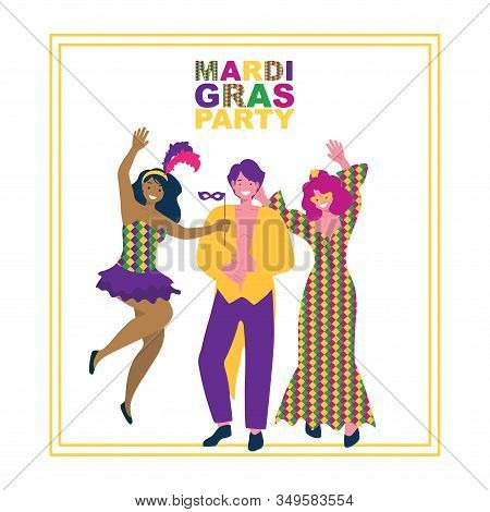 A Man And Two Girls In Masquerade Costumes At The Mardi Gras Festival.