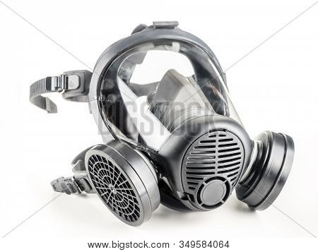 Full facepiece respirator with interchangeable filter cartridges shot over white