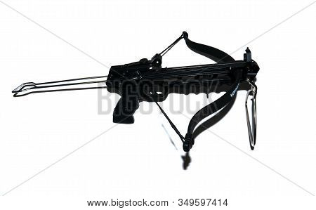 Sports Crossbow On A White Background. Shot From A Crossbow. Isolated Black Little Crossbow. View Fr