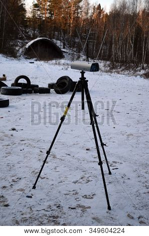 Ballistic chronograph (bullet speed chronograph). Unformal shooting range near Kiev. February 07, 2020. Kiev Region, Ukraine