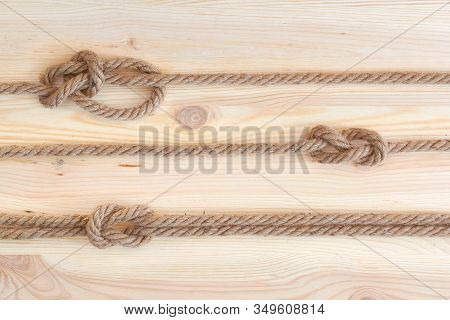 Marine Knots Used In Yachting: Figure Eight Knot, Square Knot, Bowline Knot. Nautical Knots On Woode