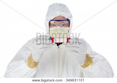 2019 Novel Coronavirus. 2019-nCoV.  Wuhan, China Coronavirus. Doctor or Medical Scientist examines a vile of blood infected with the Wuhan, China Coronavirus. Doctor in Protective suit with virus.  