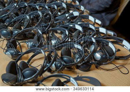 A Set Of Headphones For Simultaneous Translation During Negotiations In Foreign Languages. Headphone