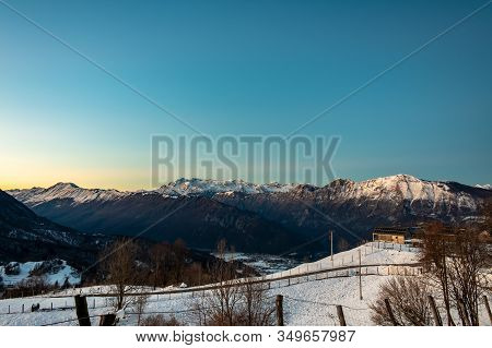 Winter Sunset In The Julian Alps