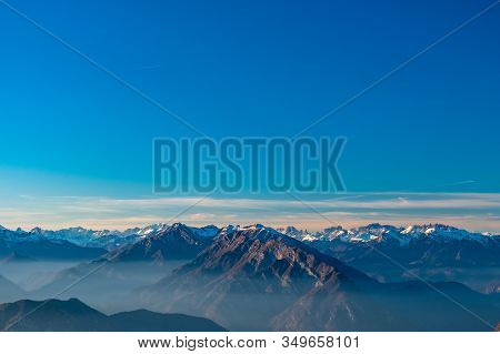 Winter Sunset From An Alpine Peak Of Friuli-venezia Giulia