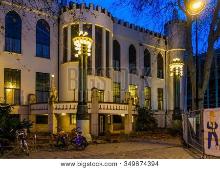 Front View Of The Tilburg City Hall By Night, Former Royal Palace Of Willem Ii, Beautiful Historical