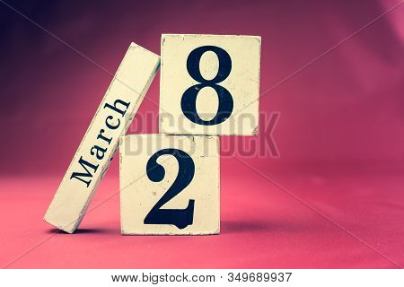 March 28th, Twenty-eighth Of March, Day 28 Of Month March - Vintage Wooden Calendar Blocks On Maroon