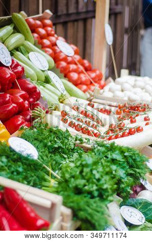Various Fruits And Vegetables For Sale At Market Stal