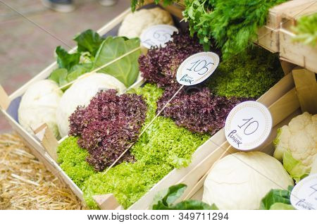 Various Fruits And Vegetables For Sale At Market Stal
