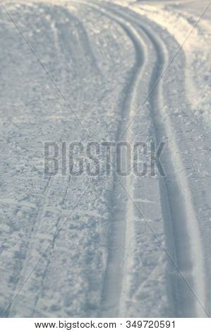 Ski Track In Snow. Hilly Snowy Surface. Active Winter Holiday Concept. Stock Photo For Web And Print